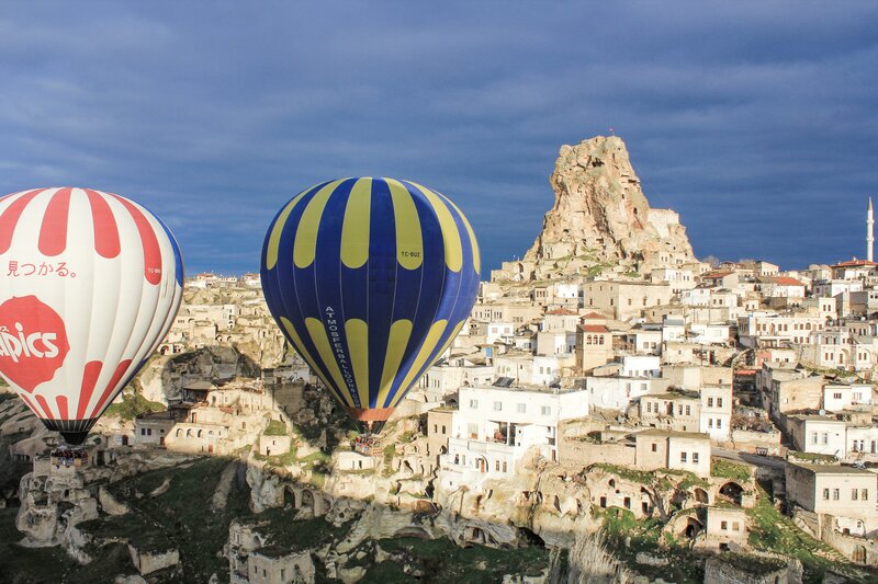 Hot air balloons over Cappadocia fairy chimneys